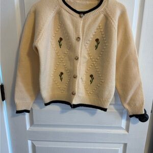 Cream Cardigan with Black Trim and Embroidery